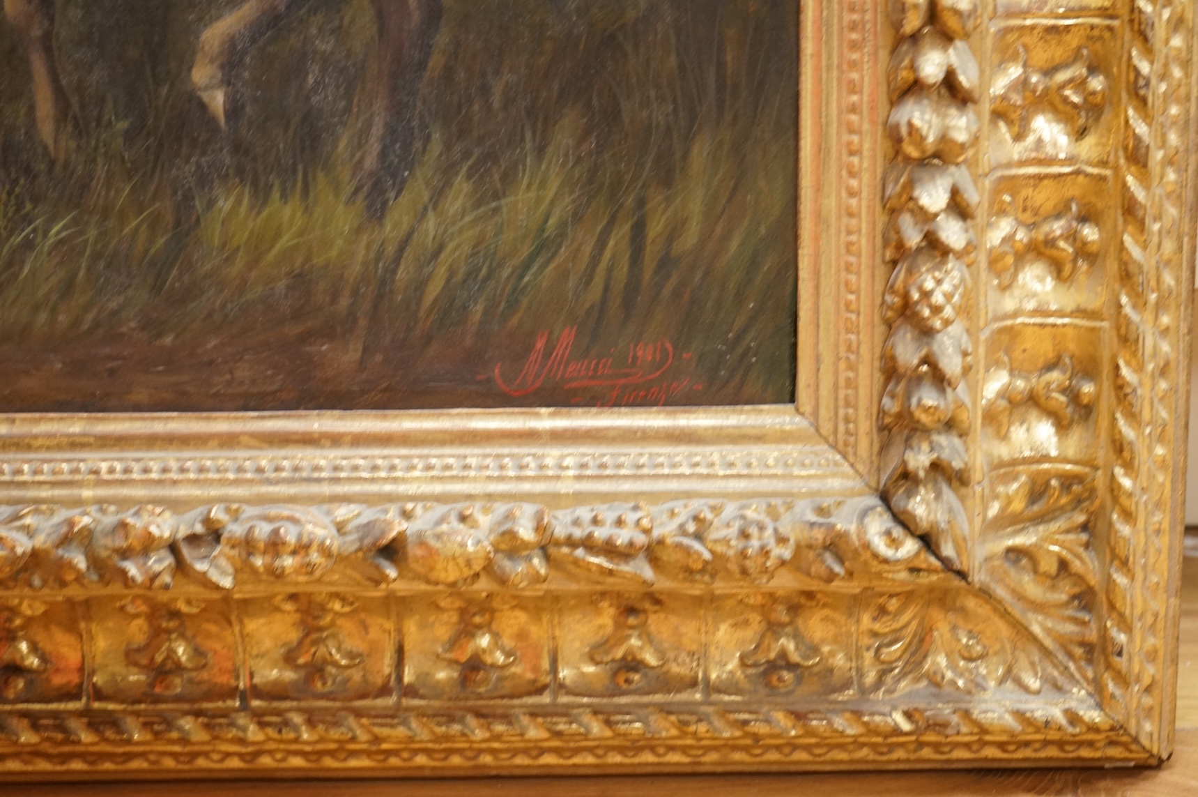 Michelangelo Meucci (Italian, 1840-1909), Study of a donkey, cat and dogs before a landscape, signed and dated 1901, oil on canvas, 44 x 64cm, ornate gilt frame